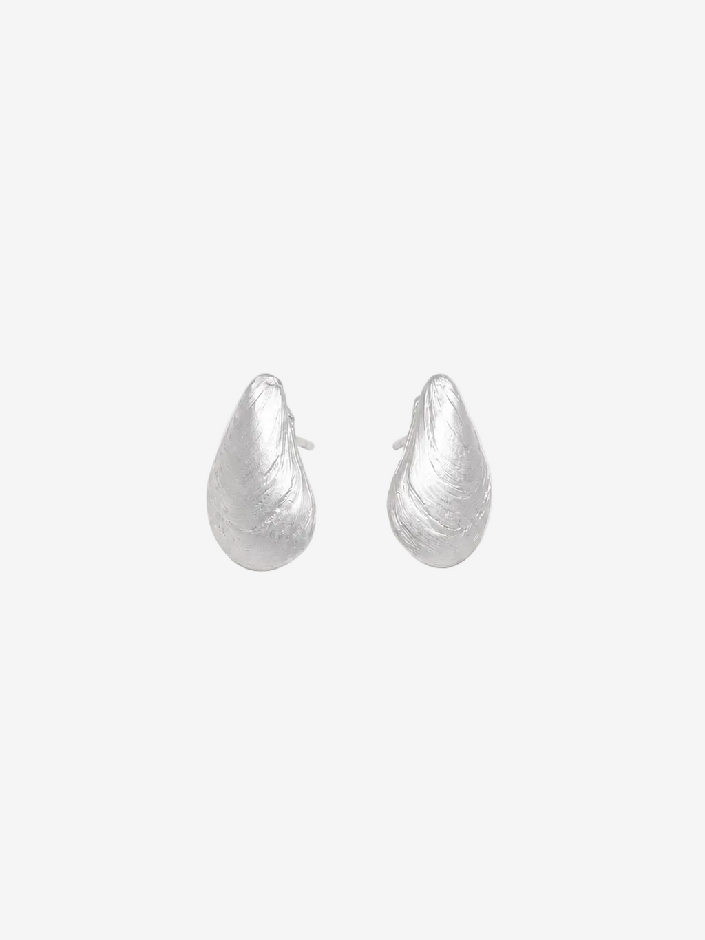 Pair of silver teardrop-shaped earrings on a light gray background