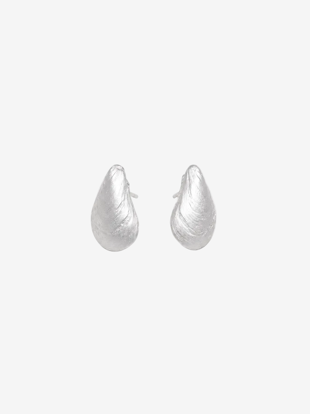 Pair of silver teardrop-shaped earrings on a light gray background