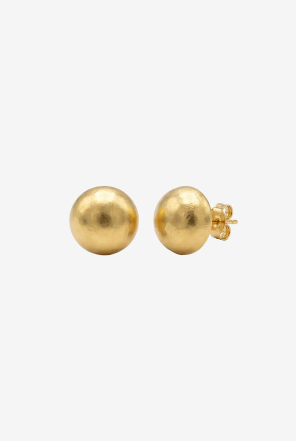 Gold ball earrings on a white background