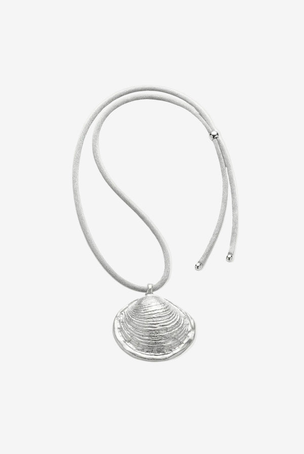 Silver necklace with a shell pendant on a light gray background